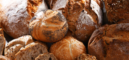 Assorted bakery products including loafs of bread and rolls