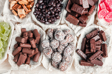 Assortment of delicious chocolate candies background. Chocolate candy isolated 