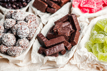 Assortment of delicious chocolate candies background. Chocolate candy isolated 