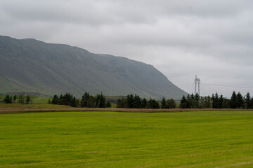 Fototapeta na wymiar Landscape of mountains on overcast day in Selfoss South Iceland