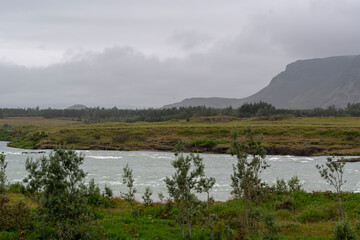 Fototapeta na wymiar Landscape of Olfusa river on overcast day in Selfoss South Iceland