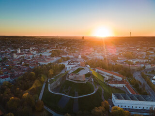 Aerial view of Gediminas tower and Vilnius old town in the evening during the sunset.