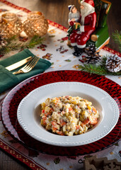 Traditional New Year's salad Russian and Ukrainian salad on the festive table