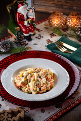 Traditional New Year's salad Russian and Ukrainian salad on the festive table