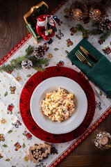 Traditional New Year's salad Russian and Ukrainian salad on the festive table
