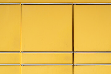 A yellow package pick-up station