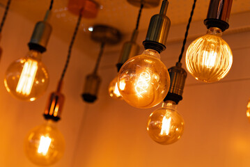 Retro edison lamp in a modern style. Home interior decoration option, vintage pendant lamp decor.