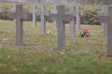 Flower bouquet in the graveyard. Lowyat cemetery, city of Limoges, France