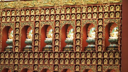 Buddha statue. Buddhist sculpture. images of chinese buddha in Singapore temple. Buddha Tooth relic...