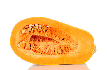 One half of a ripe organic pumpkin, close-up, isolated on white.