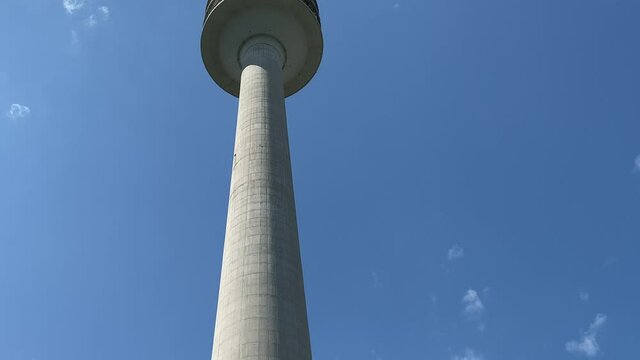 Munich, Germany. The Olympiaturm has an overall height of 291 m and a weight of 52,500 tonnes. At a height of 190 m there is an observation platform . 4K