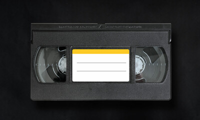 video cassette, video tape on dark background

