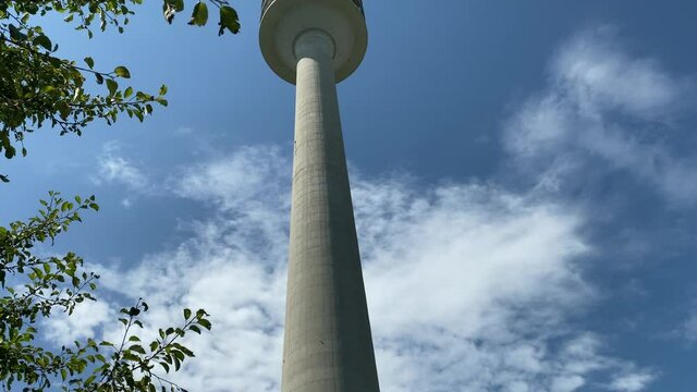 Munich, Germany. The Olympiaturm has an overall height of 291 m and a weight of 52,500 tonnes. At a height of 190 m there is an observation platform . 4K