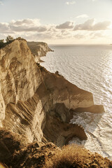 View of Logas Beach and the amazing rocky cliff in Peroulades. Corfu island. Greece