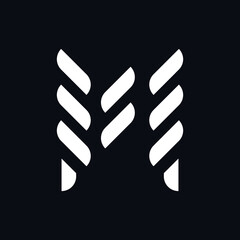 abstract letter M logo design concept template isolated on dark background