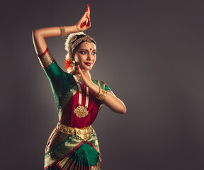 Beautiful indian girl dancer of Indian classical dance bharatanatyam . Culture and traditions of India.	
