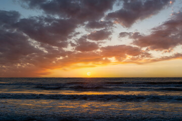 Sunrise over the sea with a beautiful cloudscape
