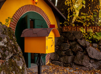 a mailbox for mail. bright yellow mailbox in retro style. beautiful details.