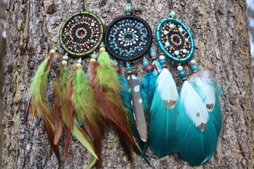 Beautiful dream catchers with colorful feathers.