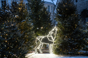 Large light animal sculpture decoration and Christmas trees. Led light holiday decorations on...