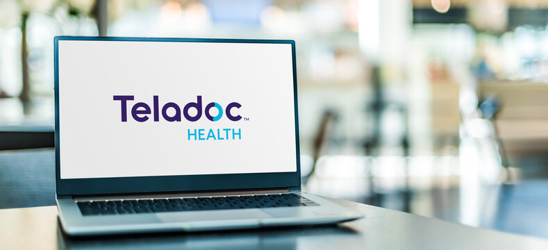 Laptop computer displaying logo of Teladoc Health