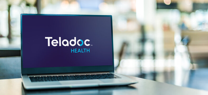 Laptop computer displaying logo of Teladoc Health