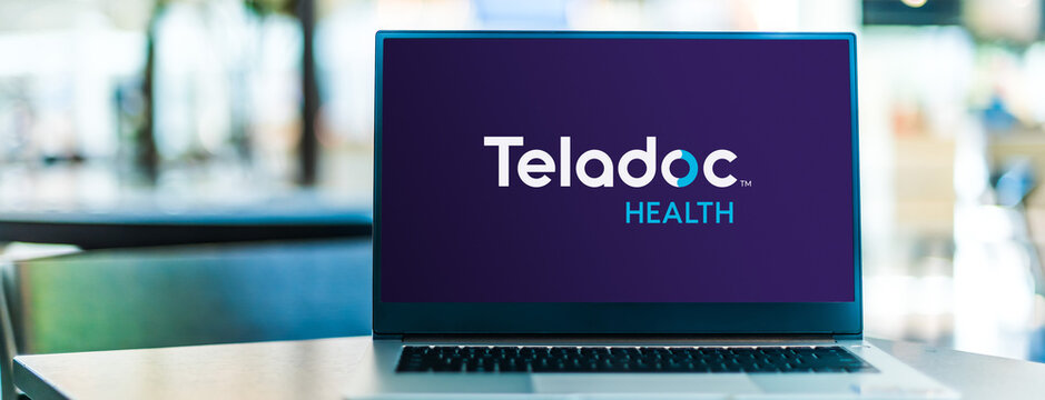 Laptop computer displaying logo of Teladoc Health