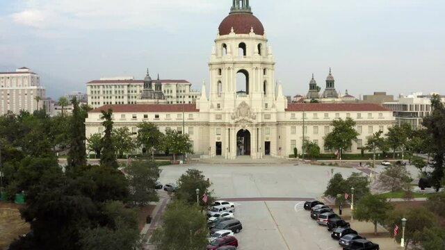 Aerial: Beautiful Shot Of Famous Pasadena City Hall, Drone Flying Over Cars In Parking Lot