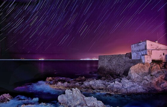 Nightscape of a lighthouse from Skikda Algeria with star trails