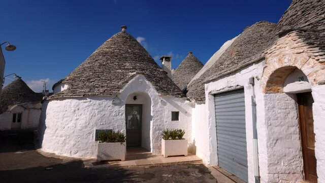 Historic Trulli houses in the city of Alberobello in Italy - a tourist attraction - travel photography