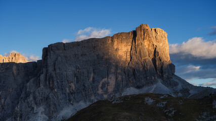 Fototapeta na wymiar Panoramic view of the mountain peaks during sunset. The Dolomite Alps, Italy. Natural scenery in the highlands. Large resolution photo.
