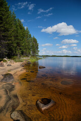 Beach in Karelia in sunny day