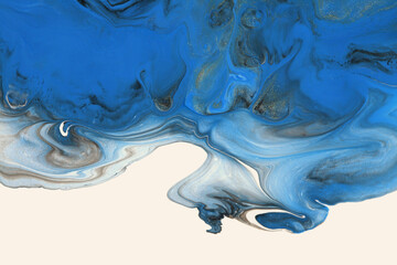 Abstract flow pour acrylic and watercolor smear blot painting. Blue and gold Color marble texture background.