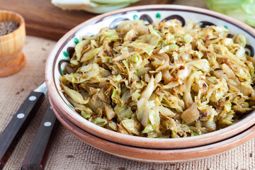 Fried white cabbage with caraway seeds and curry powder