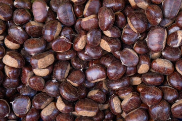 Raw fresh chestnuts kestane close-up in the market