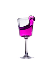 A splash of pink liquid in a glass glass isolated on a white background.
