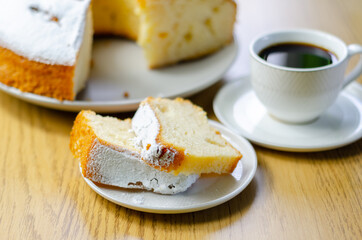 Portion of Madeira ring loaf cake served on a small plate