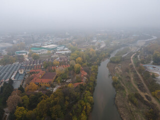 Aerial view of town of Pazardzhik, covered with fog,  Bulgaria