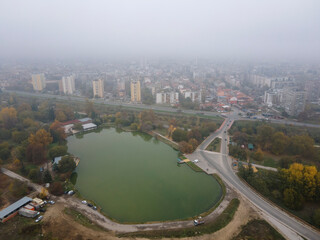 Obraz premium Aerial view of town of Pazardzhik, covered with fog, Bulgaria