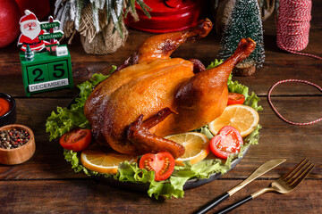 Tasty fresh baked turkey with spices and herbs for a family holiday table