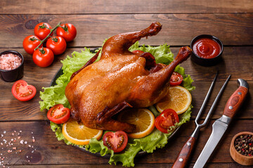 Tasty fresh baked turkey with spices and herbs for a family holiday table