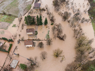 Aerial drone viwe of flooded villages, fields, farms and houses. Aftermath of devastating river...