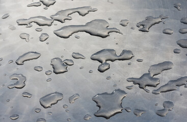 rain drops on the metallic table