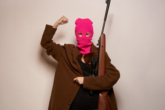 female shooter danger crime fashion isolated background
