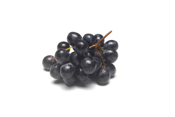 Black grapes on a white background. Fresh juicy grapes