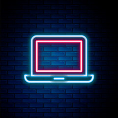 Glowing neon line Laptop icon isolated on brick wall background. Computer notebook with empty screen sign. Colorful outline concept. Vector