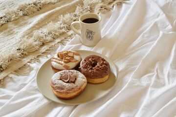 Donuts and coffee in bed