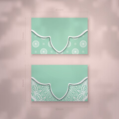 Mint color business card template with vintage white pattern for your business.