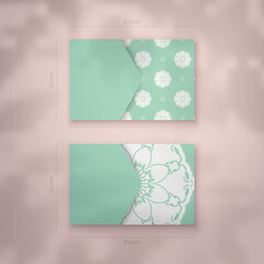 Mint color business card template with vintage white pattern for your personality.