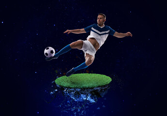 Fototapeta na wymiar Football player kicks the soccer ball into space